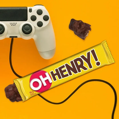 Oh Henry! candy bar with a gaming controller on an orange background